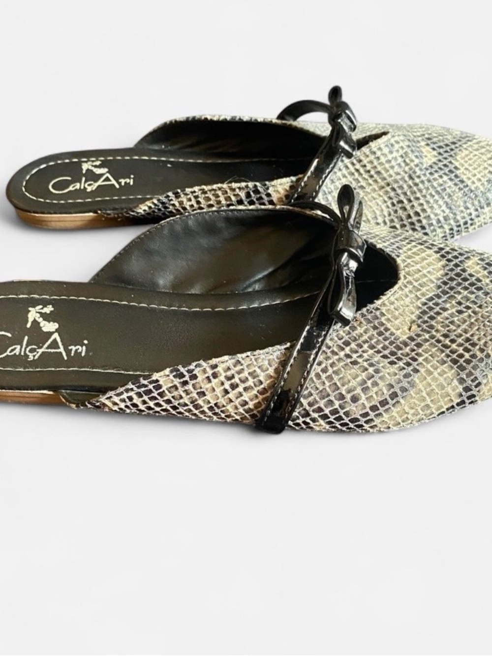 Women's Snake-Print Slip-On Flats in Black and Cream